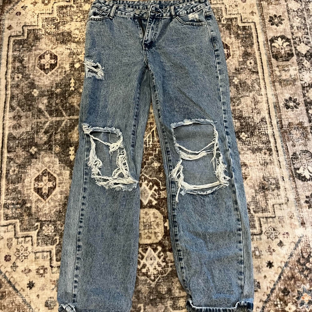 Distressed Blue Jeans